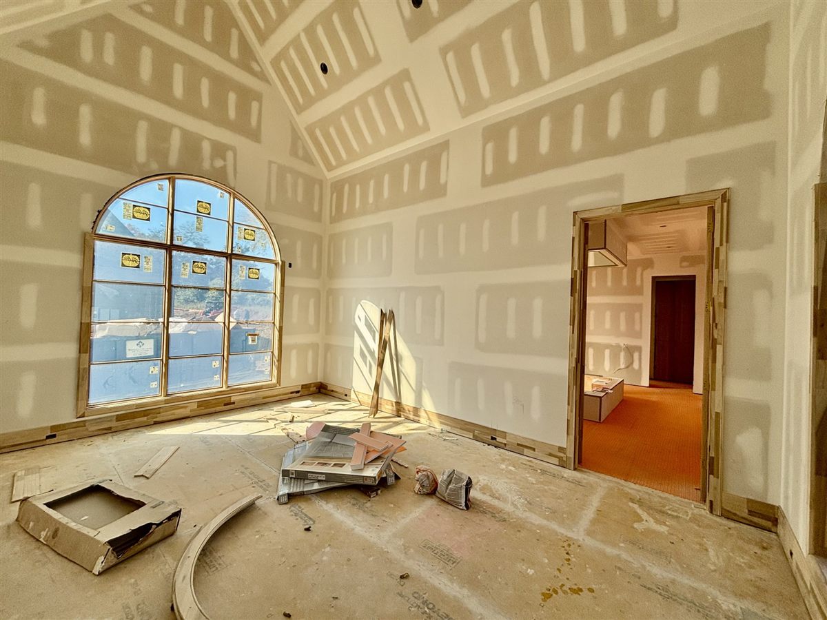 Arched window taking shape during construction
